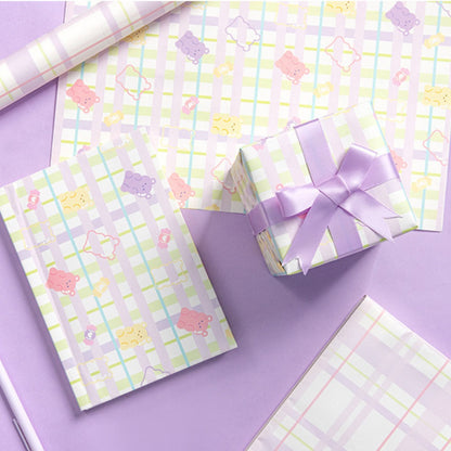 “Holding Something Adorable” Gift Wrapping Paper