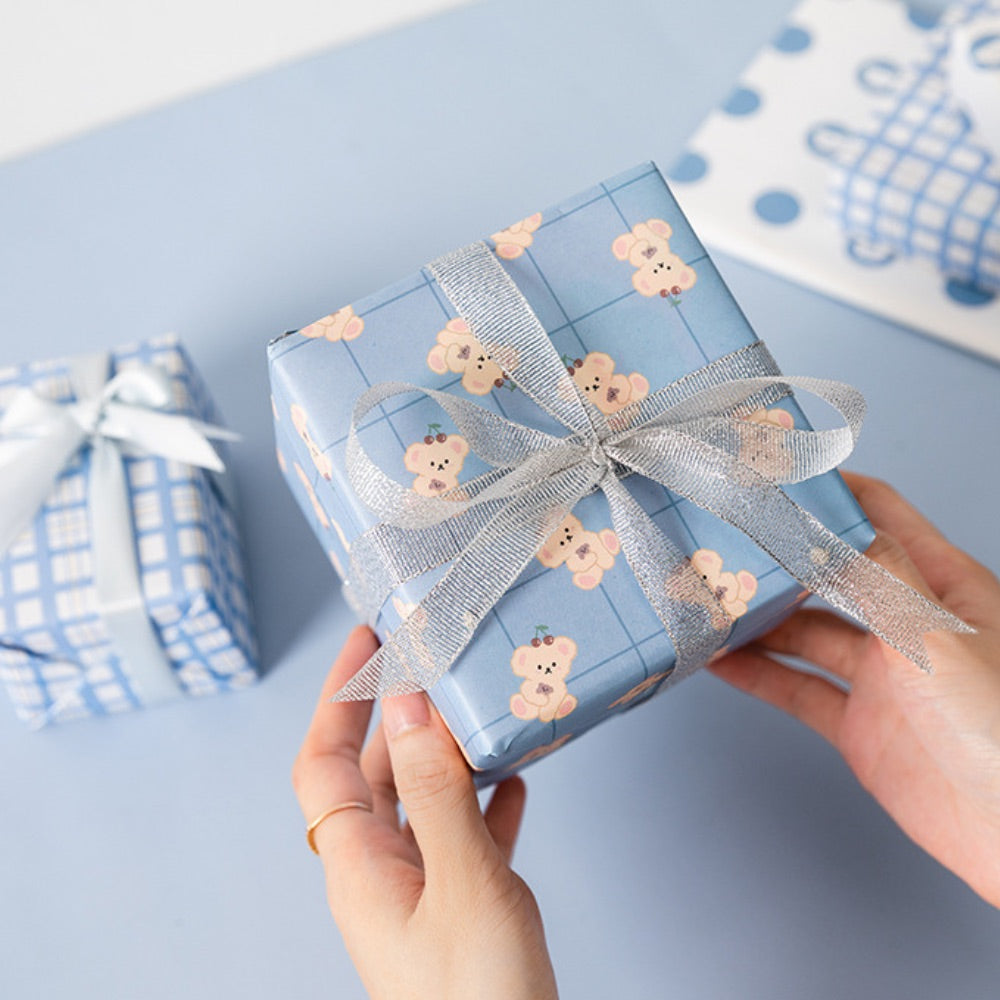 “Holding Something Adorable” Gift Wrapping Paper