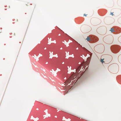 “Holding Something Adorable” Gift Wrapping Paper