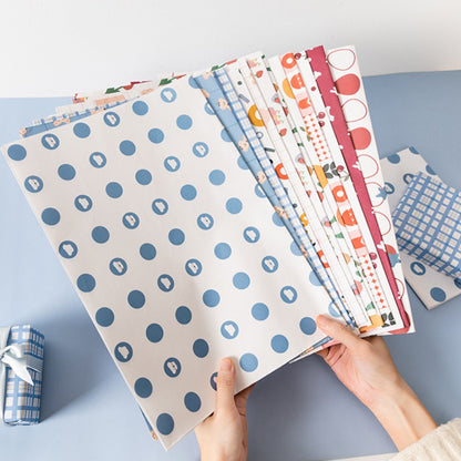 “Holding Something Adorable” Gift Wrapping Paper